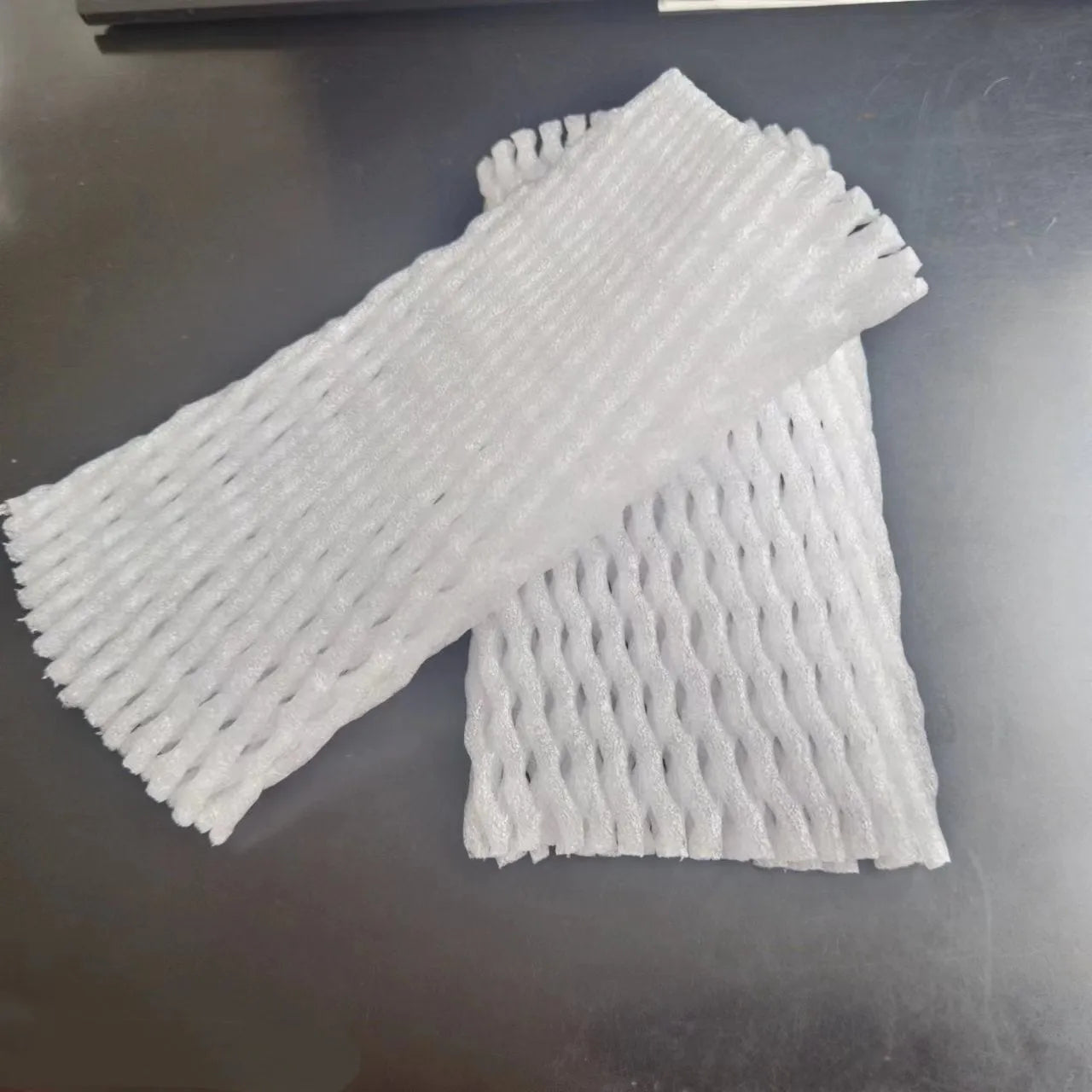 White foam shockproof protective net case showing net construction with size options from 6x5cm to 18x7cm