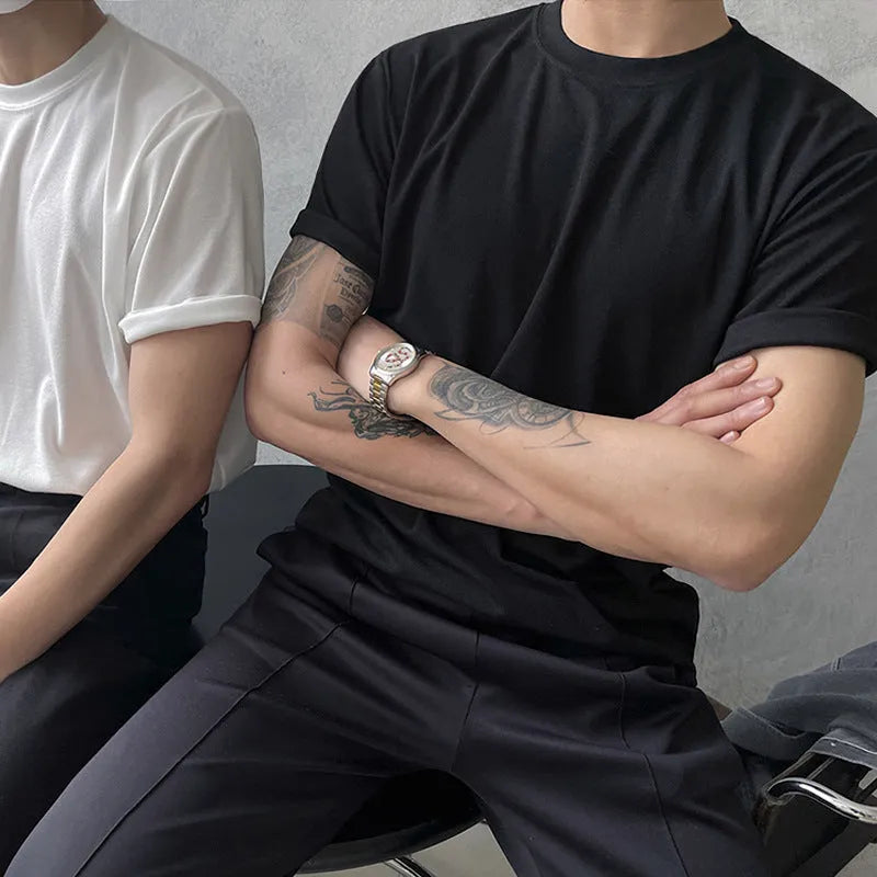 Men's slim fit cotton T-shirt in black and white solid colours with round neckline