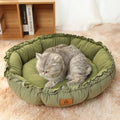 Reversible grey donut cat bed shown in both raised and flat configurations