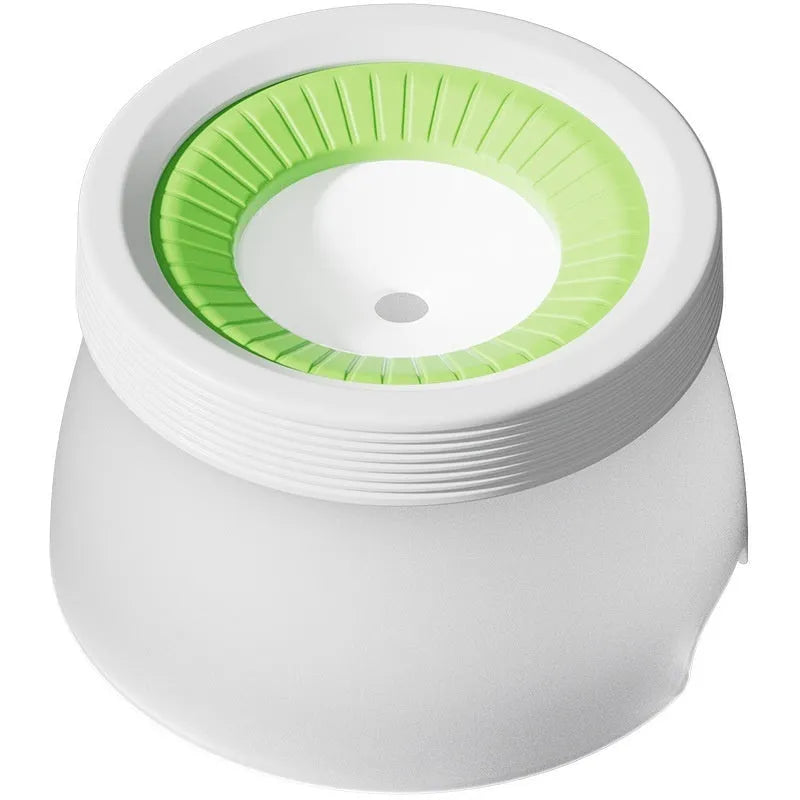 Green PP silicone suspended pet water bowl for dogs and cats on a white background