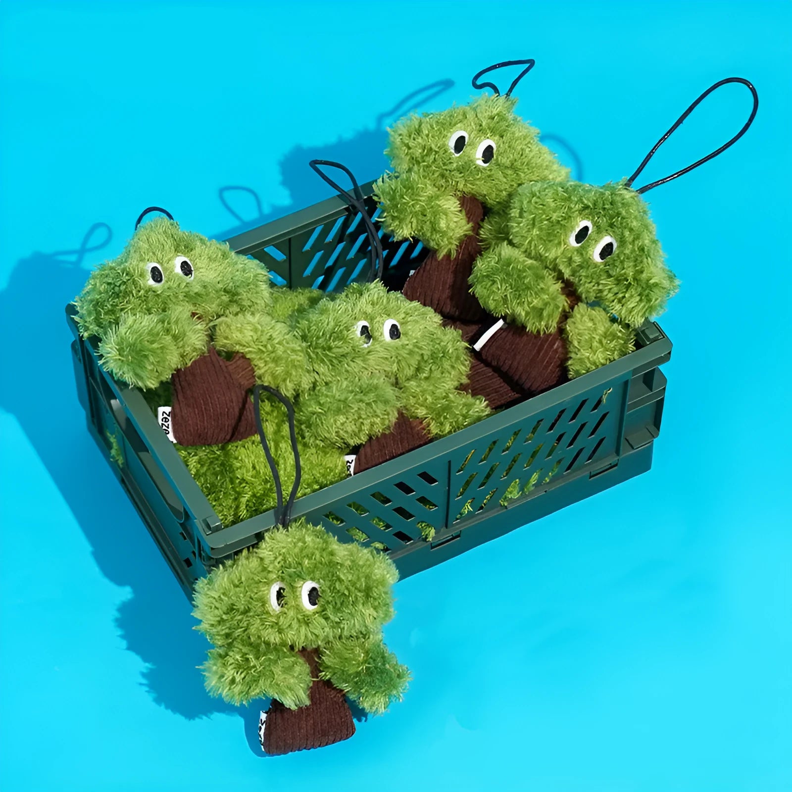 Pine tree shaped cat chew toy with fabric detail in three size options for feline dental enrichment