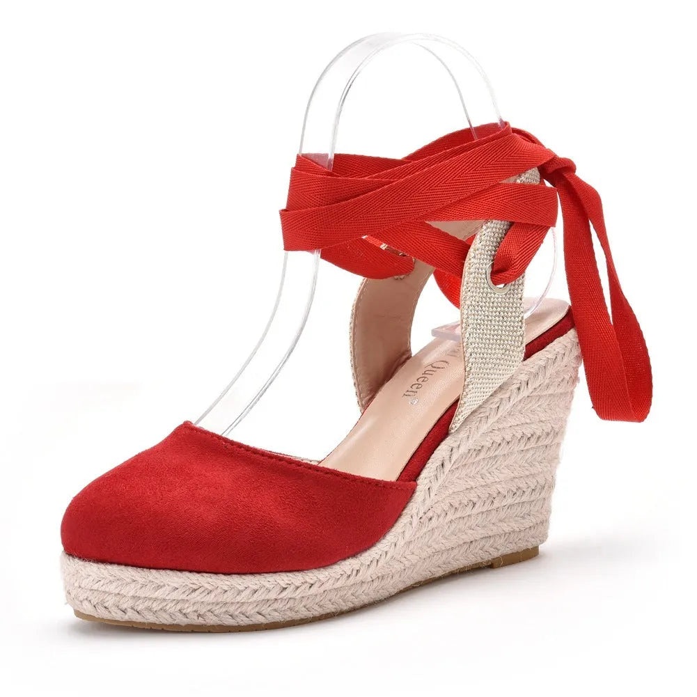 Women's bohemian wedge sandals with round toe, buckle closure and bead accents in red colour