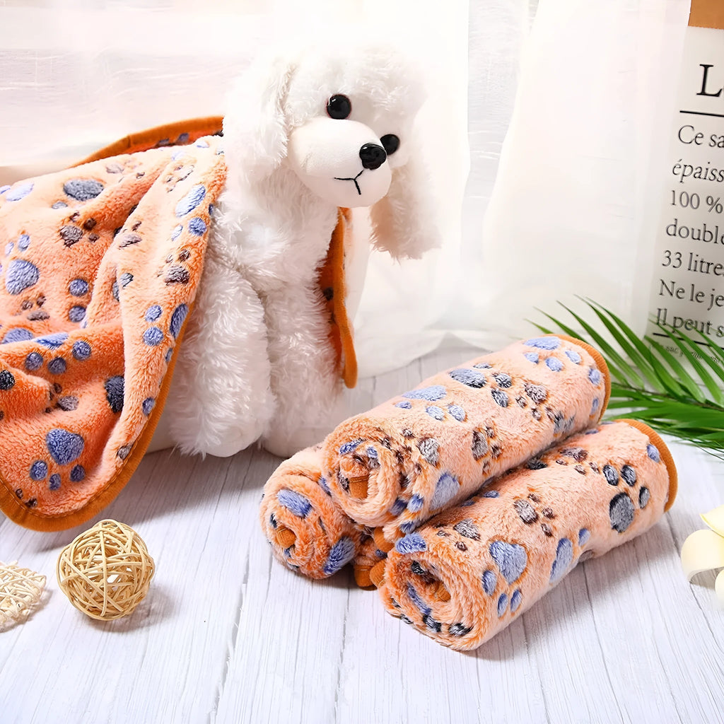 Coral fleece pet blanket with dog's paw pattern in multiple colours and sizes for dogs