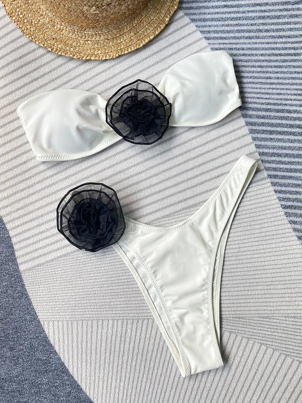 Women's polyester bikini with cross-back tube top and matching shorts in striped pattern