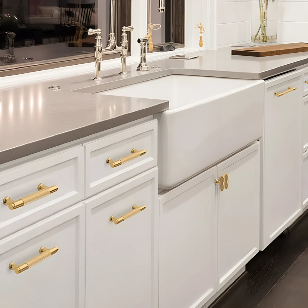 Brushed brass aluminium wardrobe handle in modern European style on a white background.