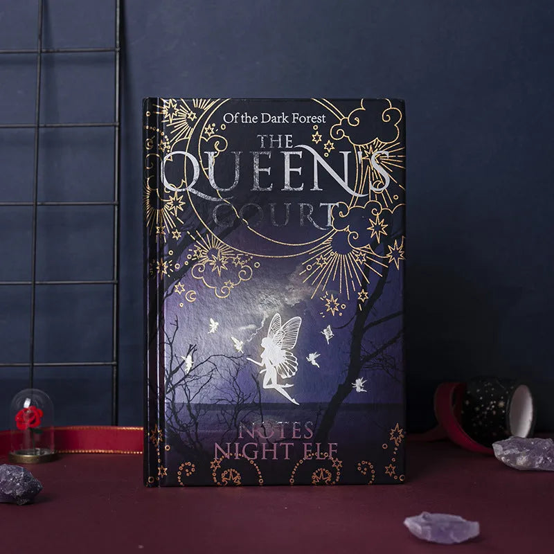 Blue and purple luminous hardcover A5 notebook open to show full-colour illustrated pages.