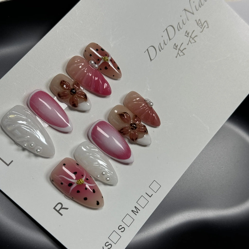 Hand-painted 3D carved nail art patches with candy patterns for almond-shaped nails.