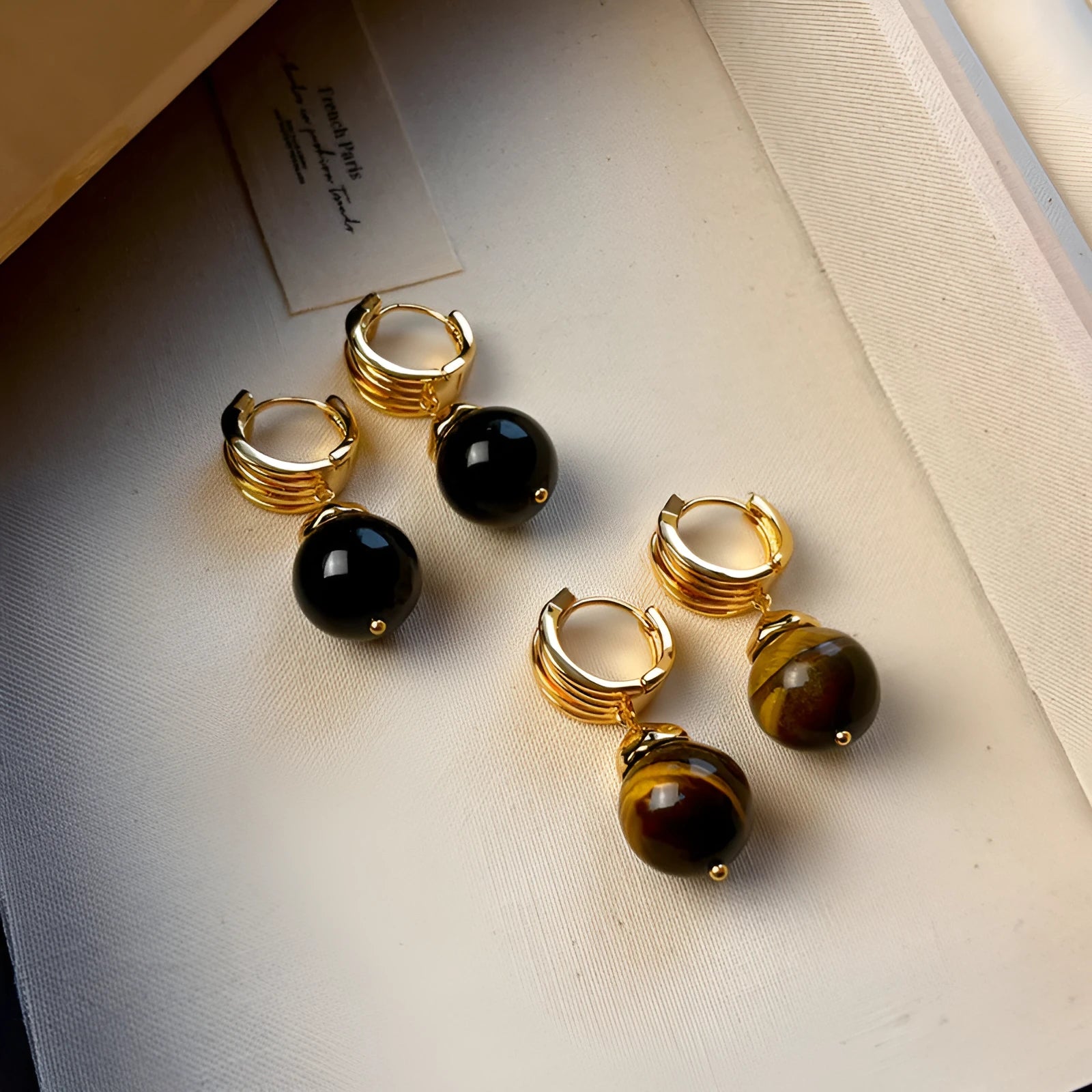 Geometric Tigereye stone earrings with gold plating in brown and black colour options