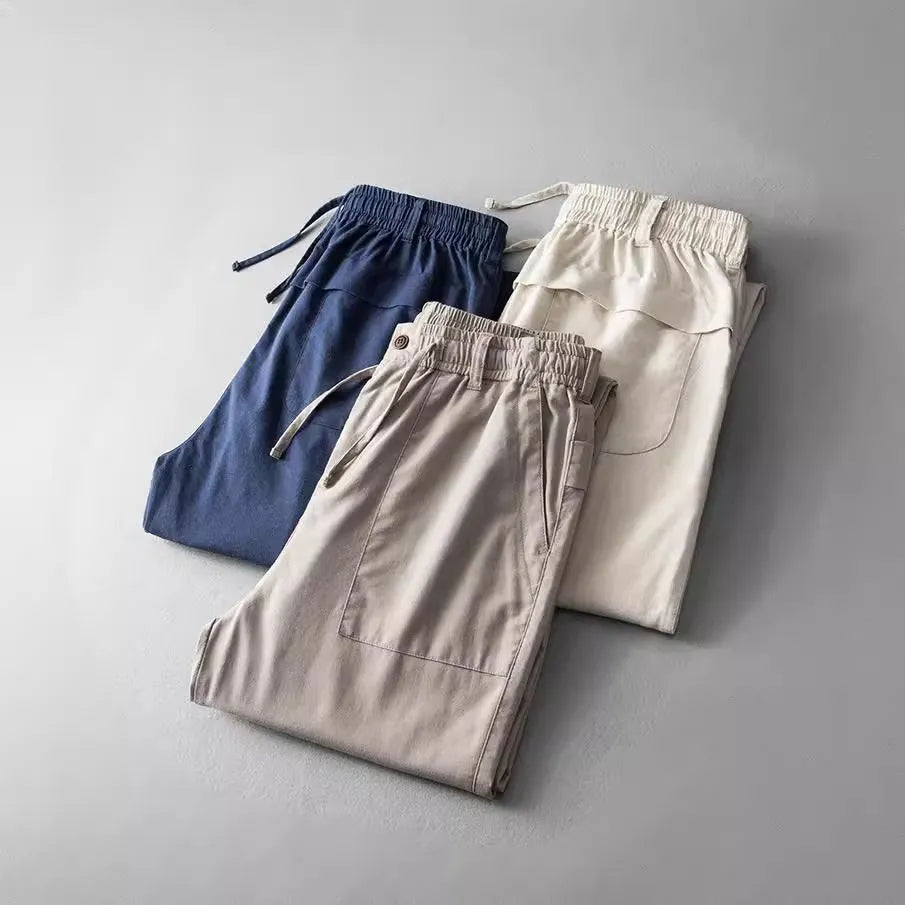 Men's linen trousers in solid colours with mid waist design for casual leisure wear