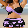 Women's purple bikini set with lace-up detail on split skirt and high-waist briefs.