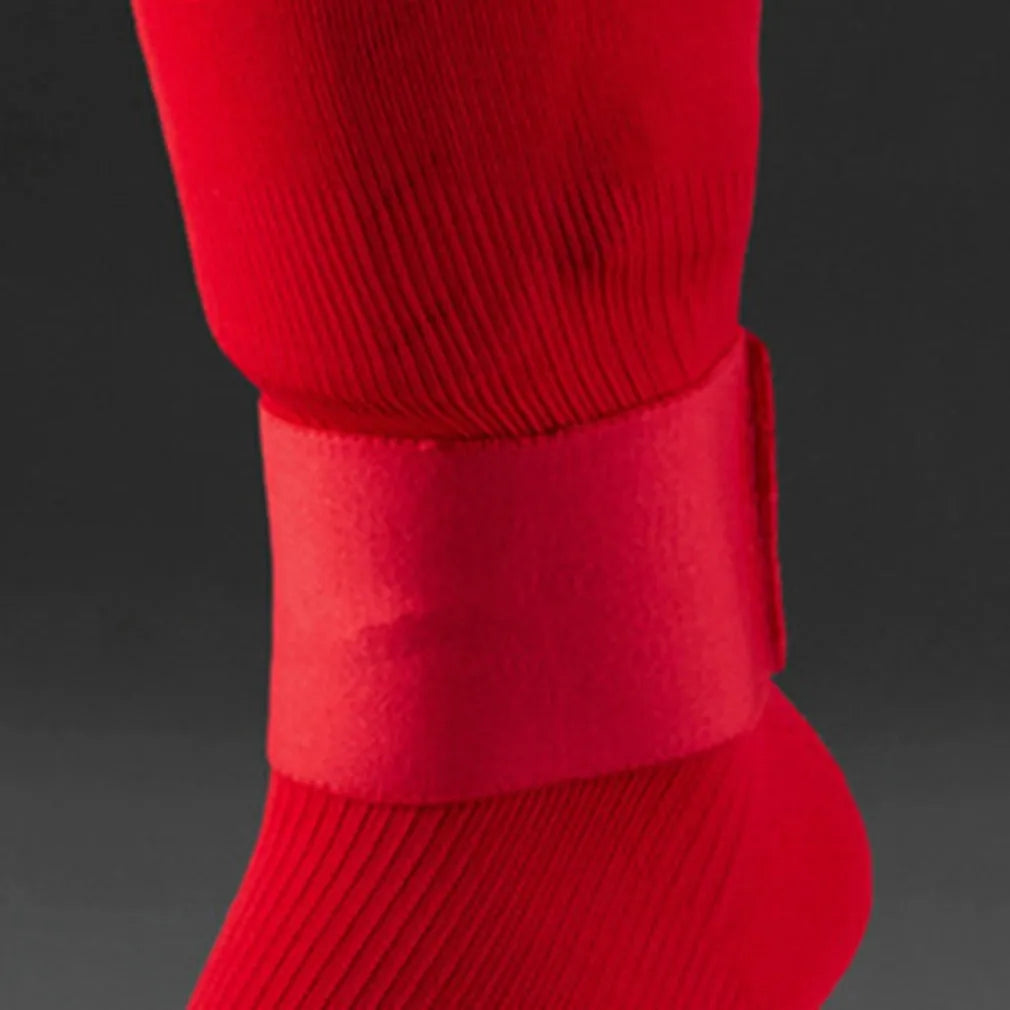 Red rubber shin guard tape belt for football and sports, shown at full 250mm length.