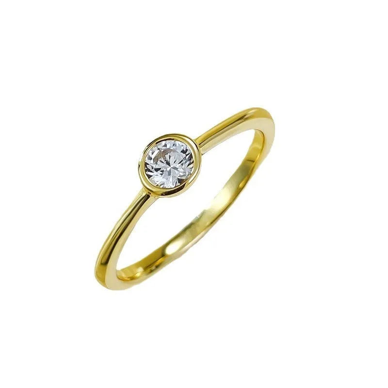 Minimalist silver crown ring with linear details in electroplated gold or platinum colour.