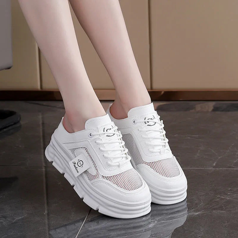 Women's black mesh half slippers with round toe and height increasing insole on rubber sole
