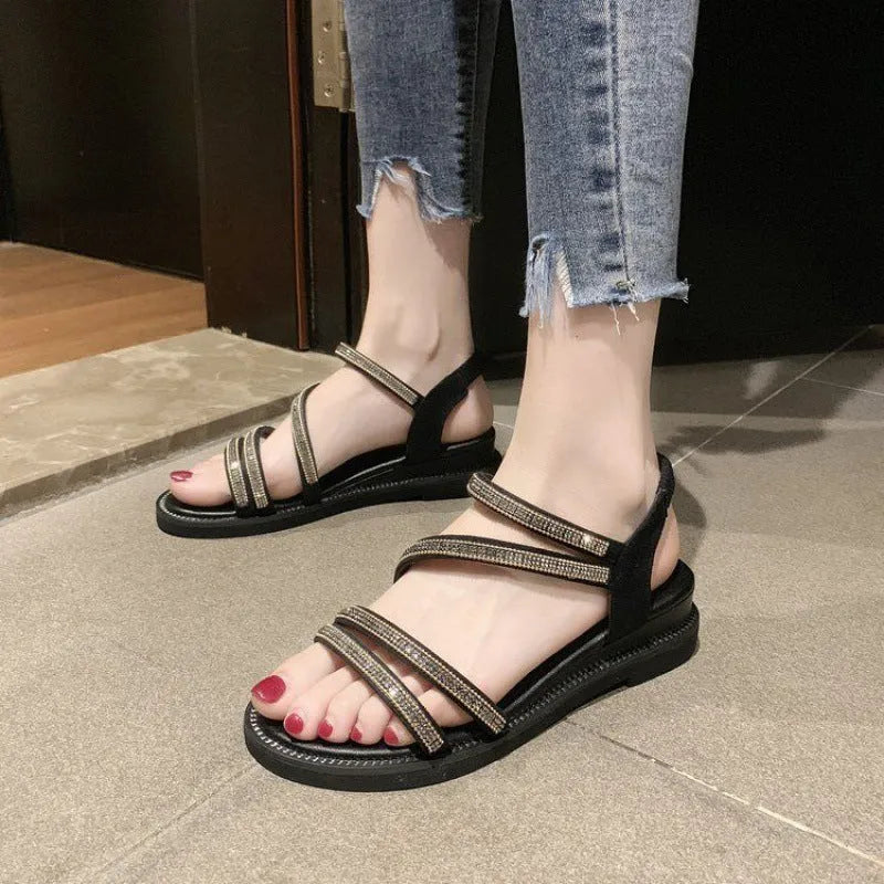 Women's gold Korean style flat sandals with rhinestone detail and elastic band