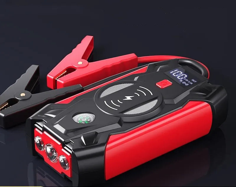 Red car emergency battery starter with digital display and air pump accessory