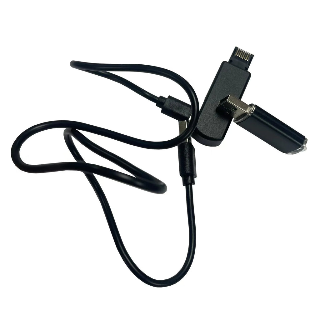 Black aluminum alloy JB Tool USB adapter for console firmware switching with Ethernet port.