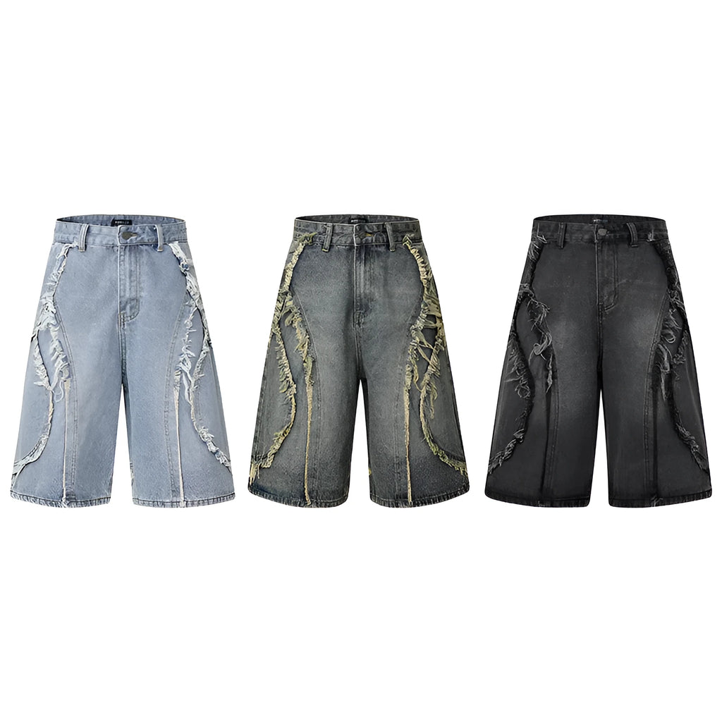 Distressed denim shorts with raw-edge hems in black, shown in a straight-leg cropped fit.