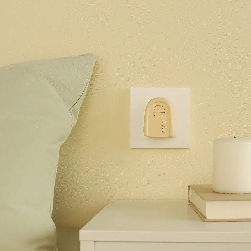 Plug-in wireless self-generating beeper doorbell in milky yellow or white colour for household use