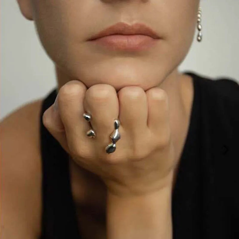 Adjustable opening brass fashion ring with circular sphere decoration in gold or silver finish