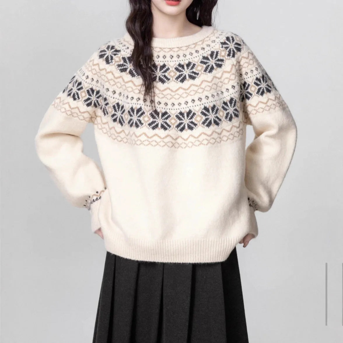 Milky white women's Fair Isle patterned knit sweater with loose fit and crew neck.