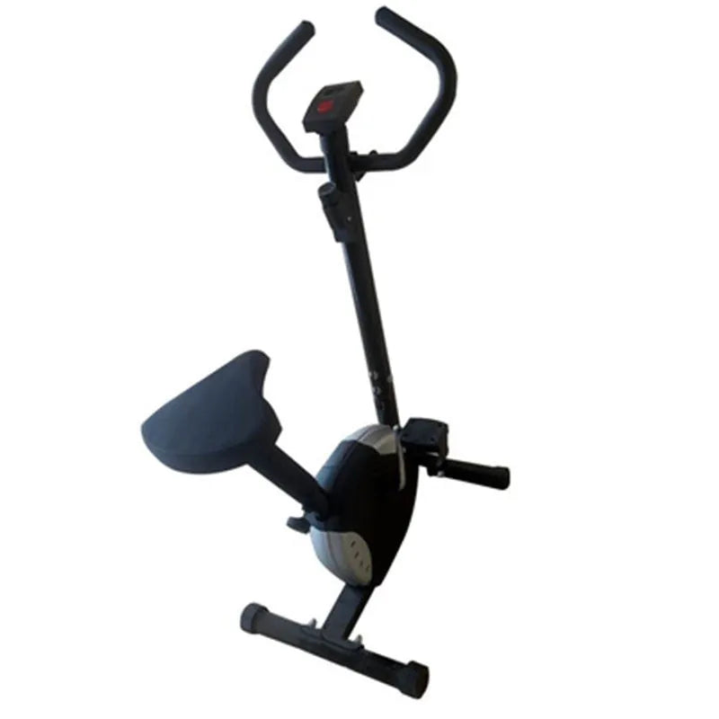 Grey spinning fitness bicycle with steel frame and foam handlebars for home office cardio training