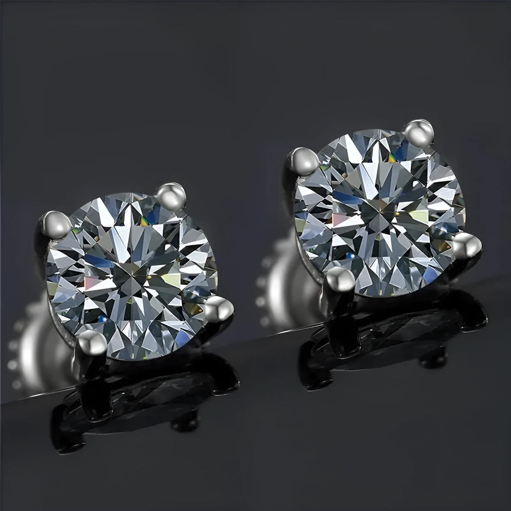 Silver screw-back moissanite stud earrings with four-claw setting and geometric shape design