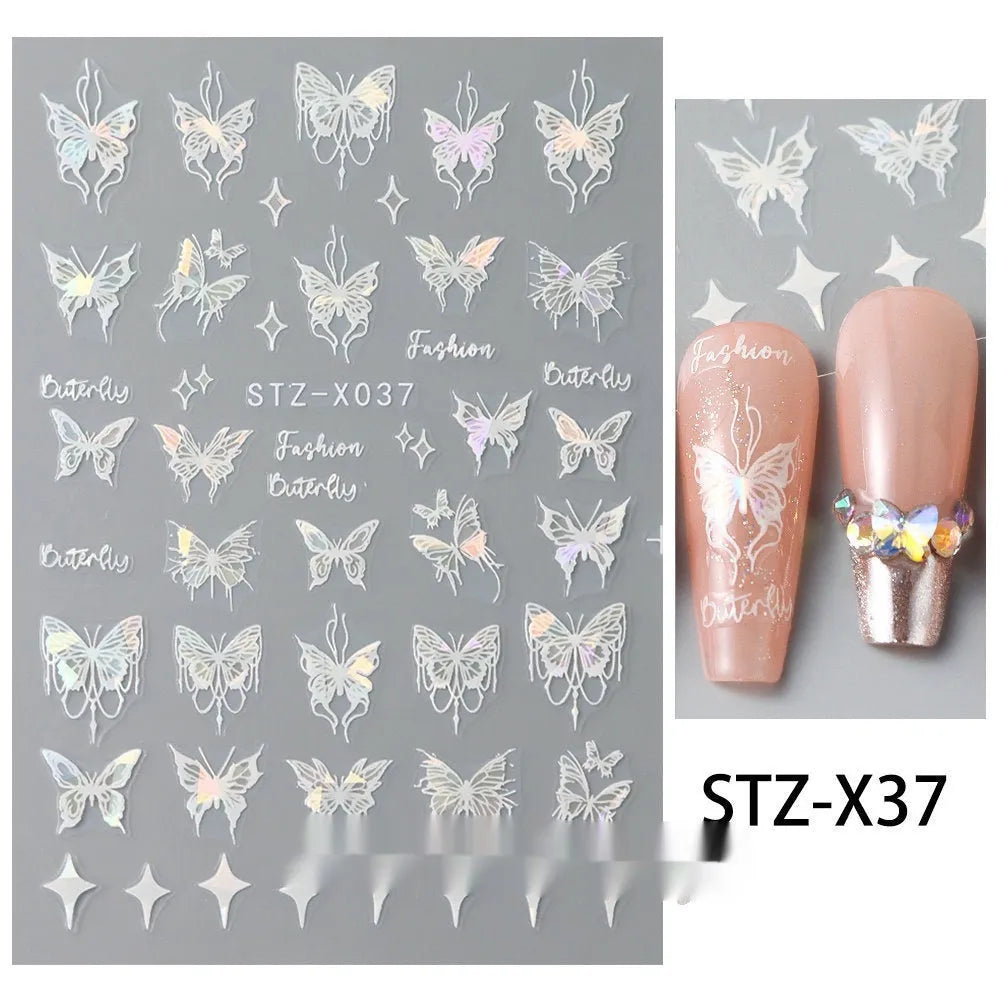 Set of 60 black and silver cartoon pattern nail strip stickers with plastic application patch.
