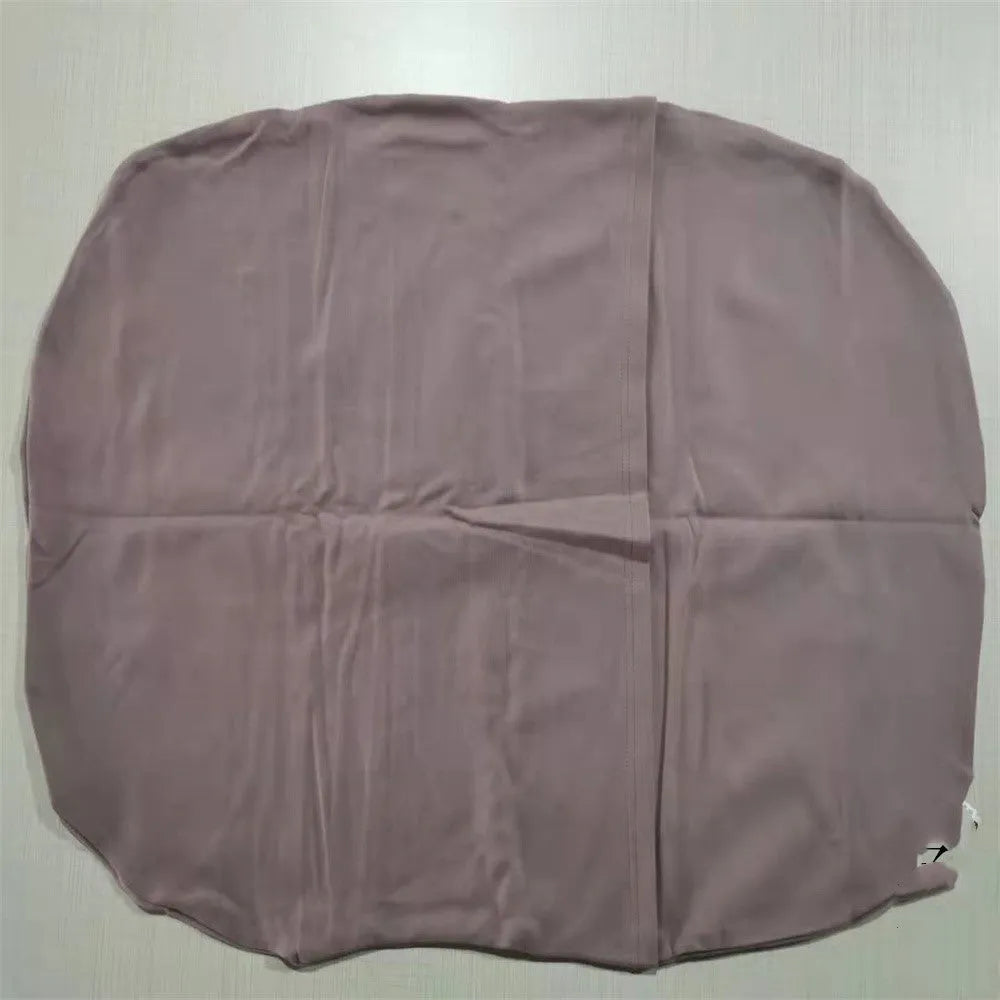 Beige portable cotton baby nest crib cushion for newborn infant sleep.