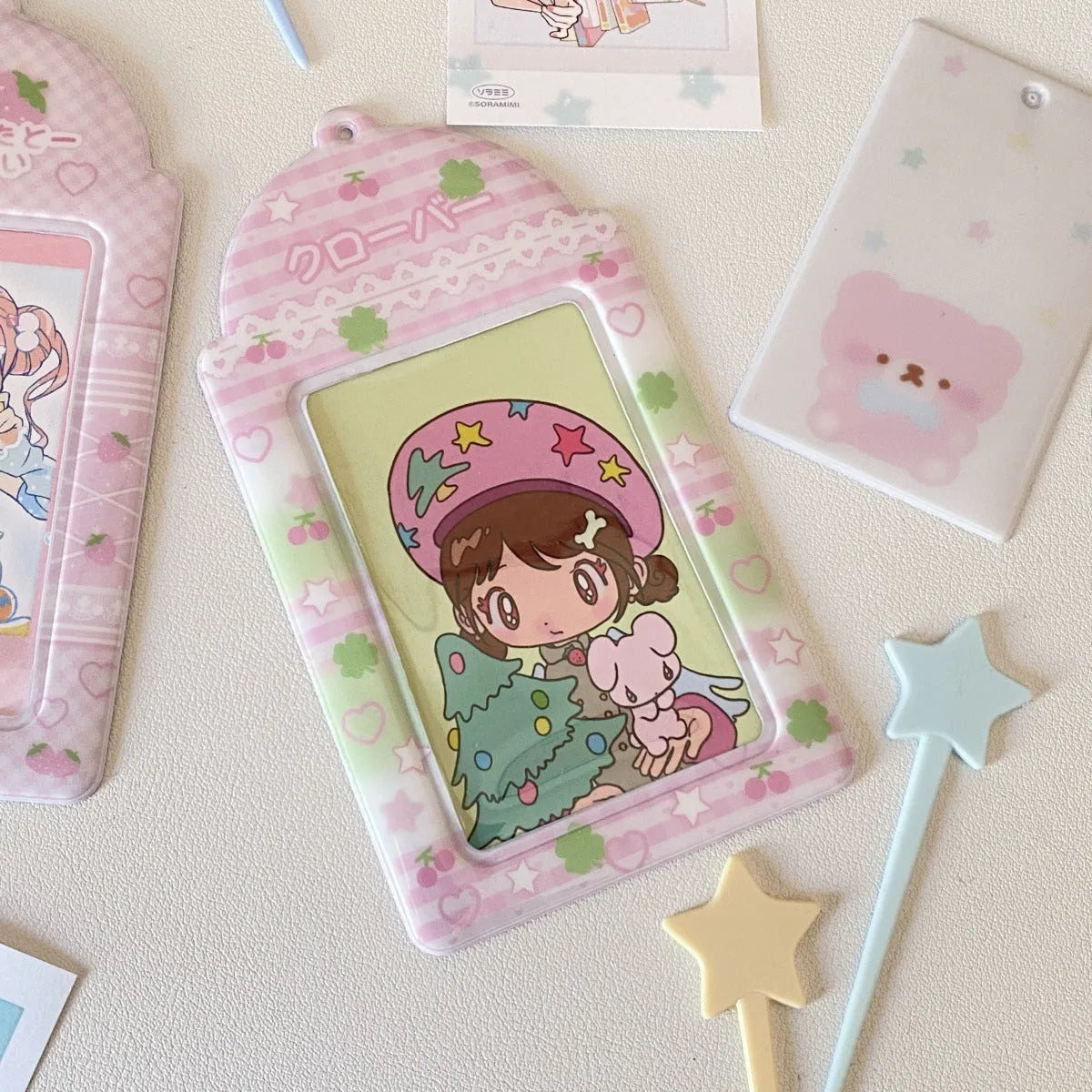 Cartoon strawberry design PVC card holder pendant with clear display pocket for lanyards.