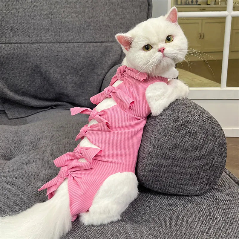 Lace-up polyester recovery clothing for cats after sterilisation, shown in multiple colours and sizes.