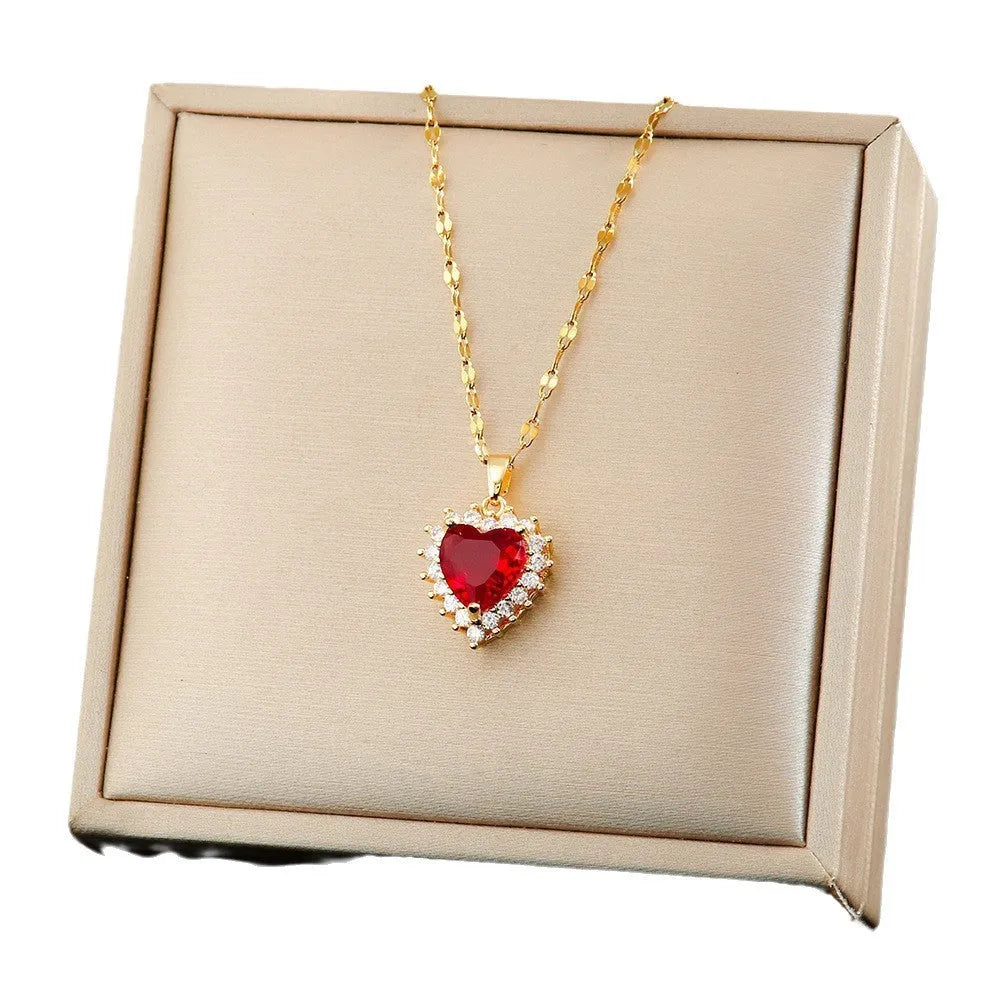 Women's hearts flower jewellery set in gold red with necklace, stud earrings, and ring made from titanium steel