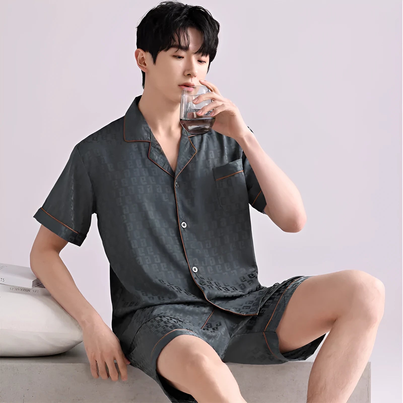 Men's ice silk summer pajama set with cardigan top and short trousers in polyester fabric