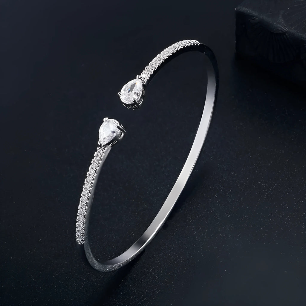 Personalised multi-zircon copper bracelet showing white and blue colour options with simple design