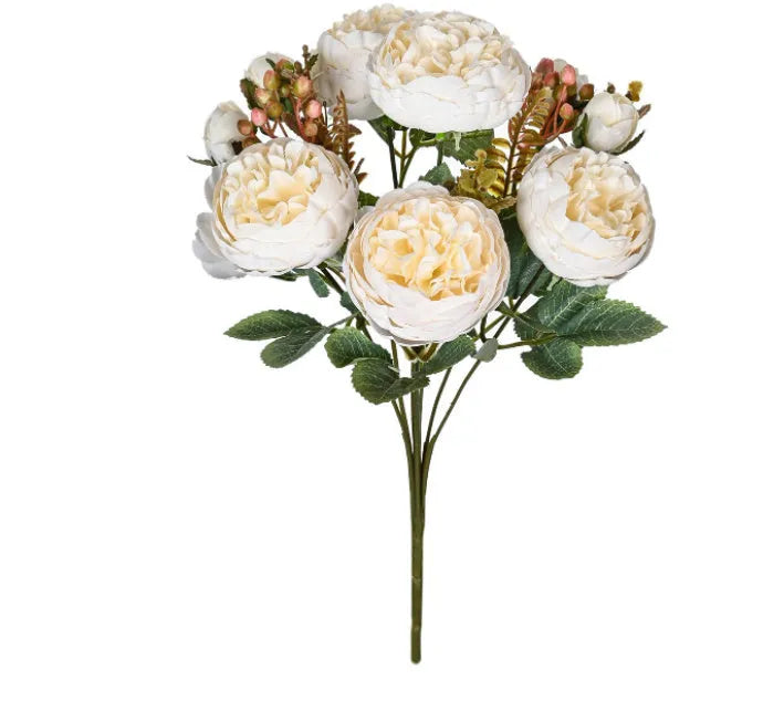 Artificial silk peony bouquet in champagne colour for home or wedding table decoration.