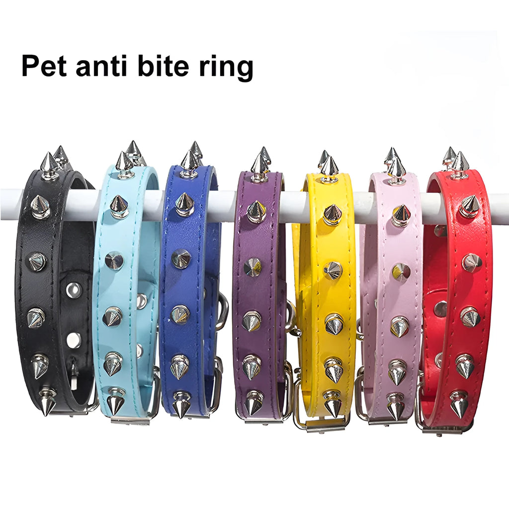A studded dog collar made of black PU leather with a row of metal spikes and a silver metal buckle.