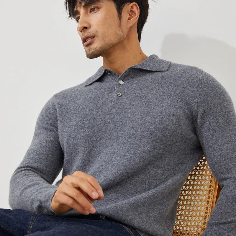 Men's sapphire blue cashmere pullover sweater with a polo collar on a hanger.