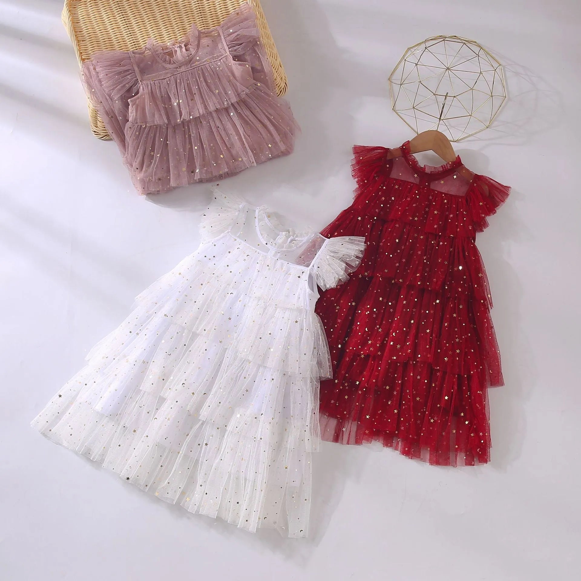 Girls sleeveless sequin star cake dress with cotton lining in blue, available in multiple sizes