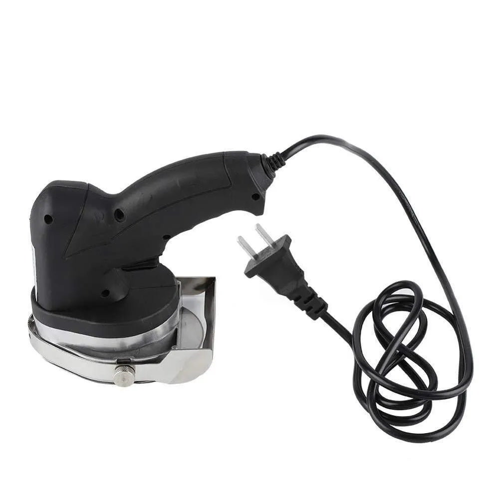 Black KS-100E electric meat cleaver with 80W motor for turkey barbecue preparation.