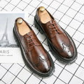 Men's black artificial PU brogue shoes with round toe on a white background.