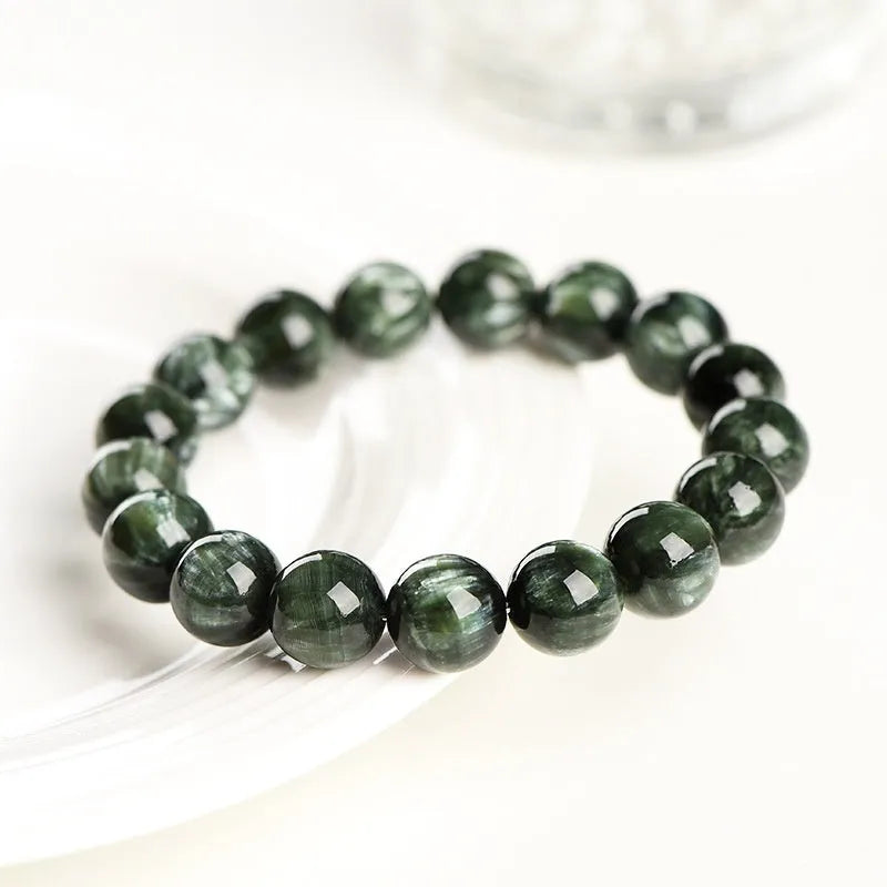 Green dragon crystal bracelet with 8-9mm round beads and geometric Ruyi design elements
