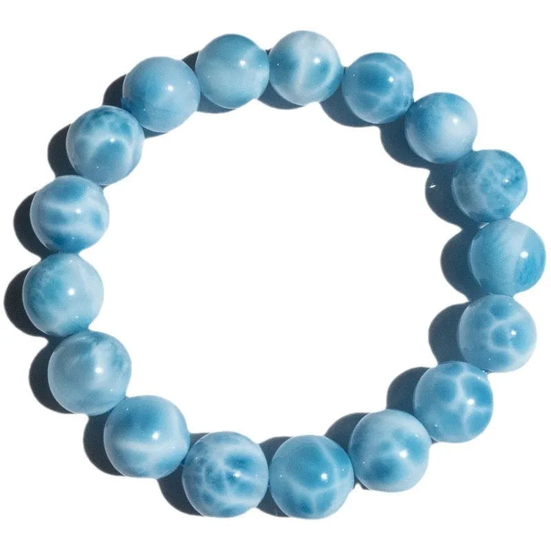 Blue bodhi bracelet with natural crystal sea-pattern stones and pearl accents in Maillard style