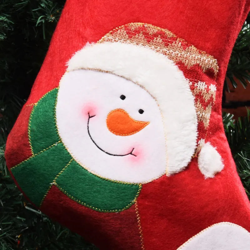 Non-woven fabric Christmas stocking decoration in elk, old man and snowman designs for candy or hanging display.