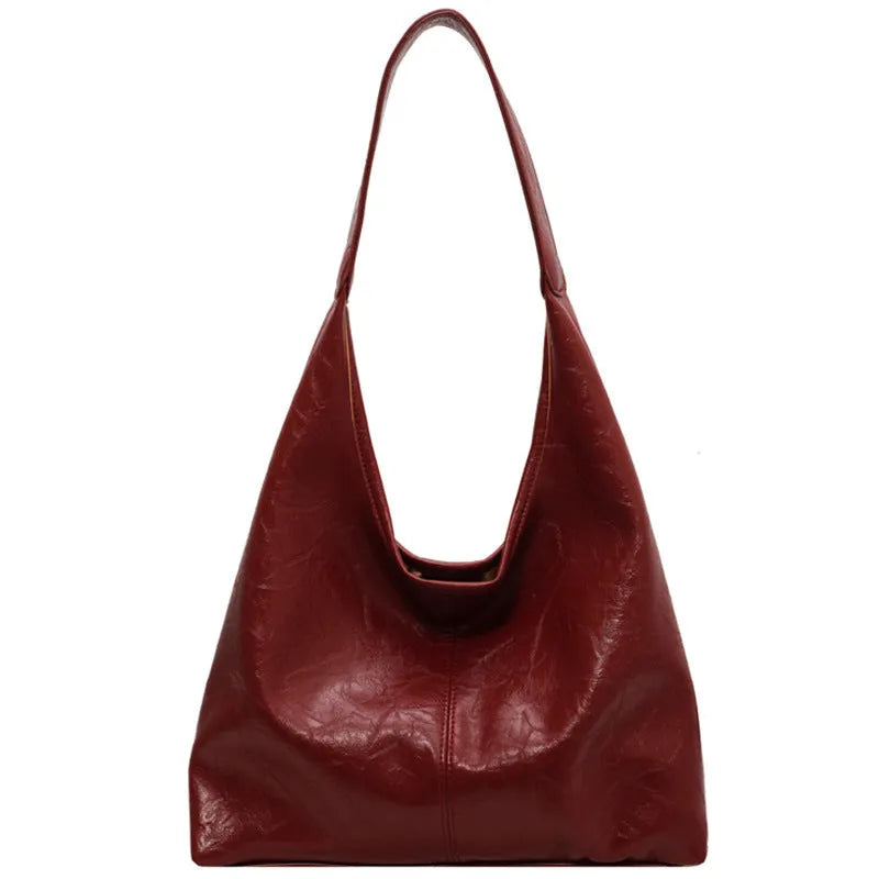 Soft PU leather casual shoulder bag with an adjustable strap, shown in a choice of colours.