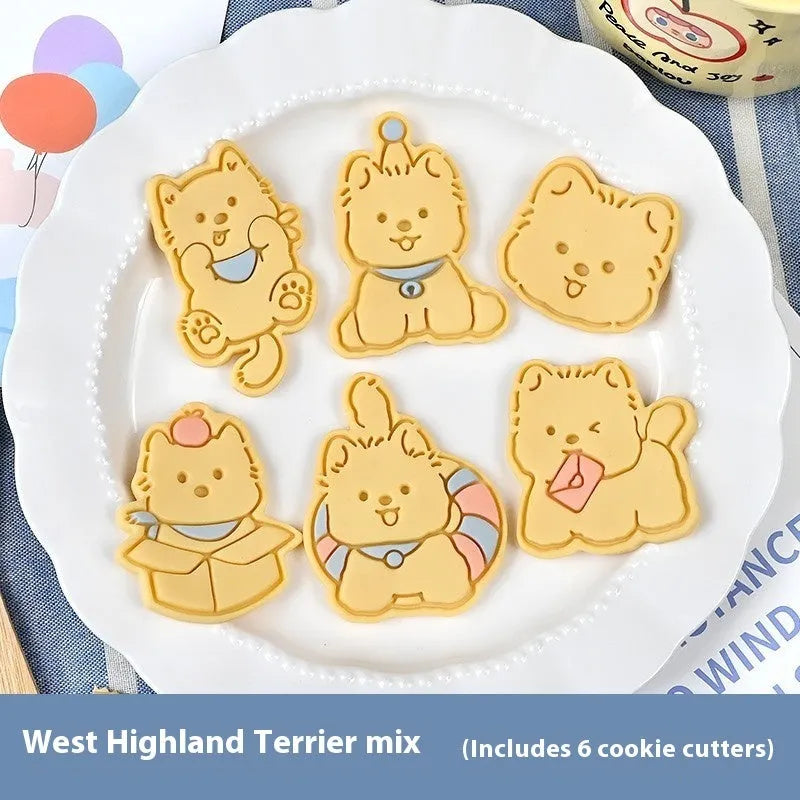 Plastic biscuit mould with puppy cartoon designs including birthday hats and swimming rings