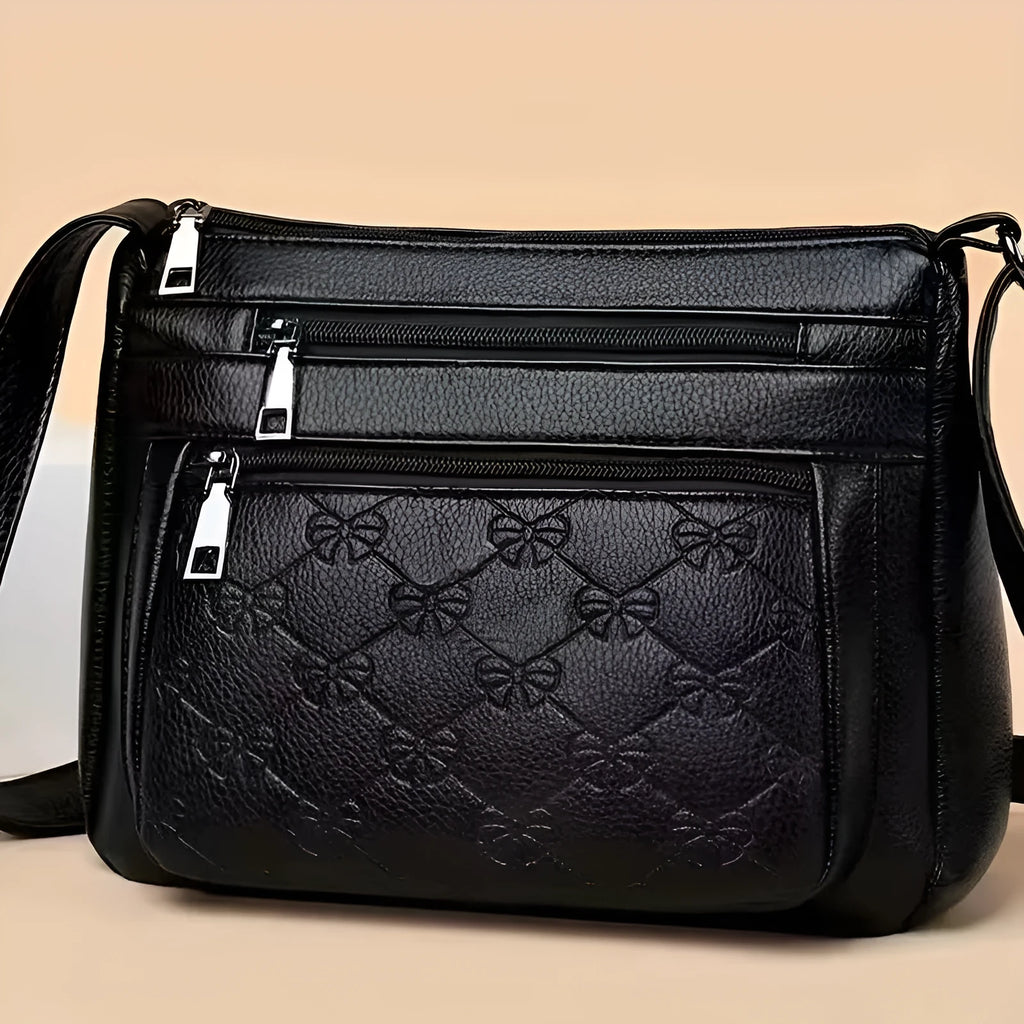 Butterfly Black women's crossbody messenger bag with embossed PU leather and slit pocket