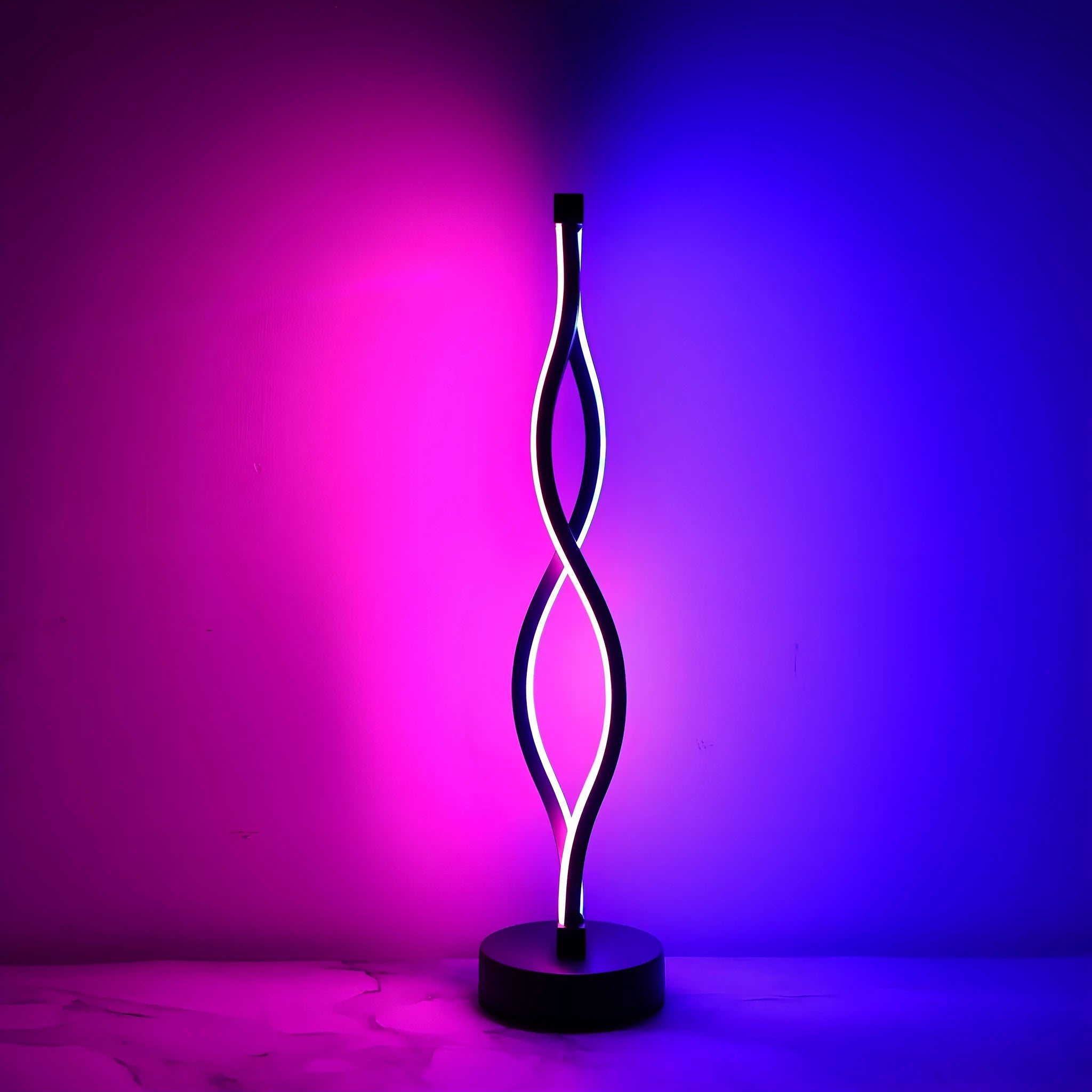 Black aluminium desk lamp with touch dimming button showing three colour temperature settings