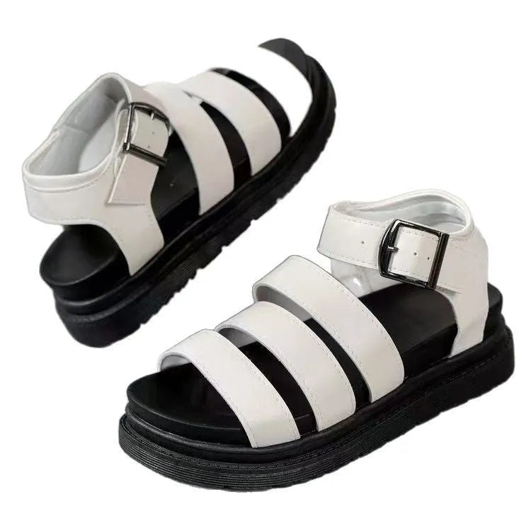 Black outdoor beach sandals with thick rubber sole and adjustable strap buckle closure