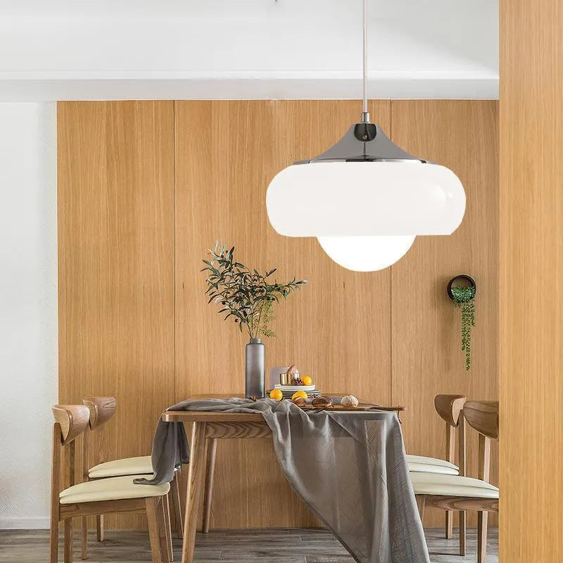 Bauhaus style three-headed pendant light with milk white egg tart glass shades