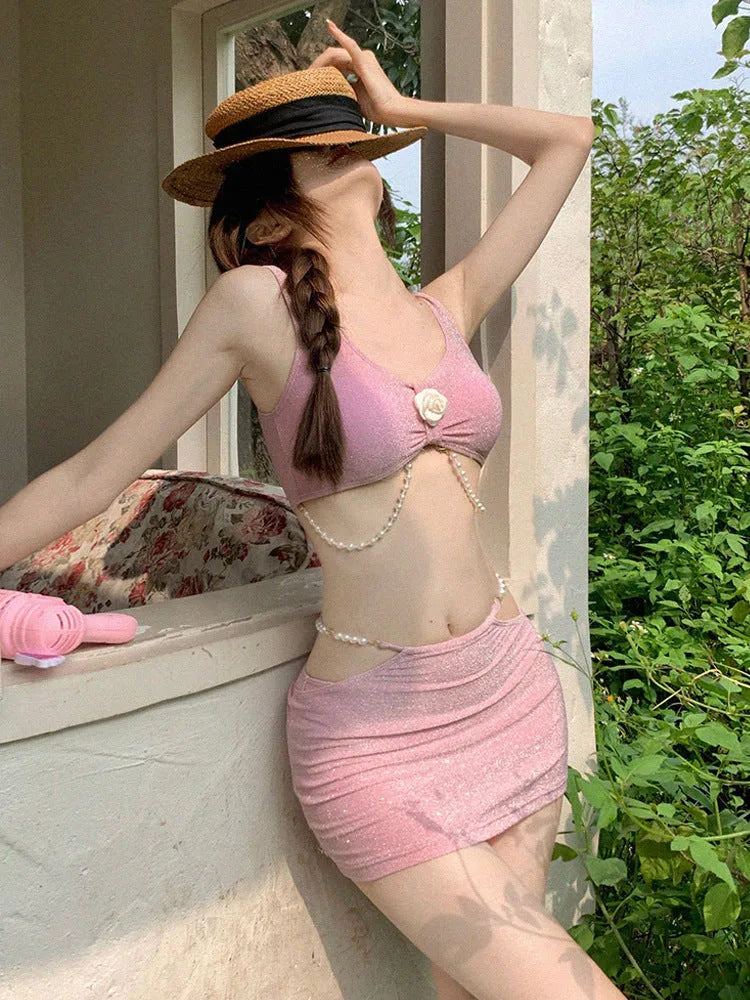 Women's black or pink three-piece polyester bikini swimsuit with brief bottoms