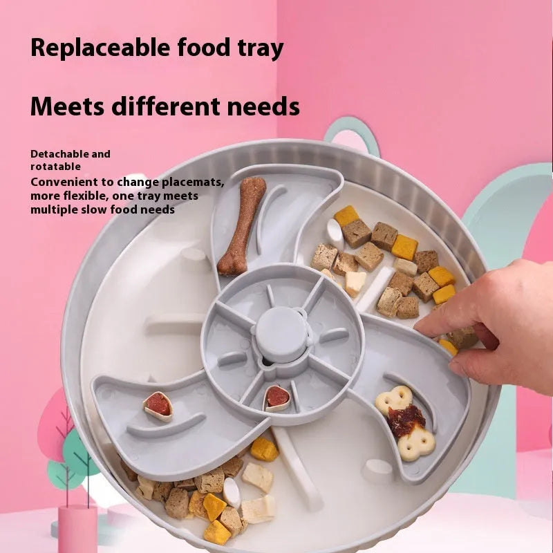 Interactive pet slow feeder bowl with a rotating design and a central, removable silicone licking mat.
